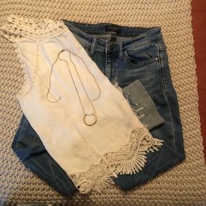 Women shirts and pants and necklace